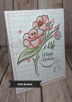 a birthday card with pink flowers on it