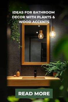 a bathroom with plants and lights above the sink, next to a mirror that says ideas for bathroom decor with plants & wood accents