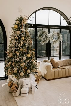 a decorated christmas tree in a living room