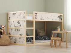 a child's bedroom with bunk beds and toys