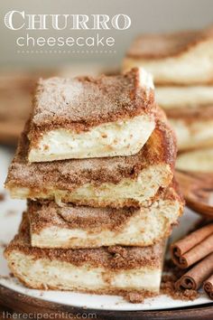 stack of cinnamon cheesecakes with cinnamon sticks in the background and text overlay that reads, churro cheesecake