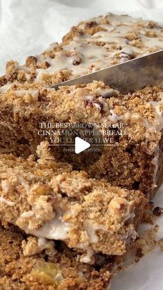 a close up of a piece of cake on a plate with a knife in it