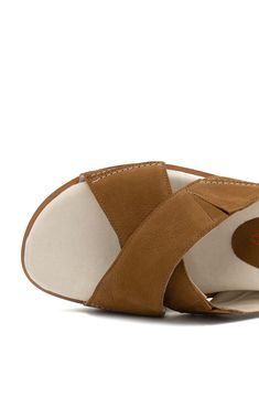 A pillowy memory foam footbed adds all-day comfort to a sandal featuring a sporty lugged sole and an elastic-eased crisscross strap for a perfect fit. 2" heel; 1" platform (size 8.5) Memory foam footbed Leather upper and lining/synthetic sole Made in Italy Platform Slides, Sandal Women, Amalfi, Slide Sandals, Criss Cross, Wedge Sandals, Memory Foam, Womens Sandals, Leather Upper