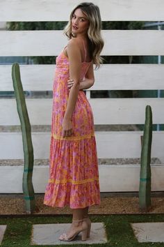 Our Marigold Maxi Dress featuring a pinks & orange hues with a sassy but sophisticated Center Cutout is sure to make you stand out in a crowd. features: Adjustable Spaghetti Straps Deep V neck Maxi Dress with Center Cutout Perfect for special occasions or to style for a brunch with your bestie! Flirty Spaghetti Strap Maxi Dress For Vacation, Pink V-neck Dress With Delicate Straps, Sundress With Delicate Straps And V-neck, Beach Dress With Delicate Straps And V-neck, Sundress With Delicate Strappy Back, Fitted Dress With Crisscross Straps For Vacation, Sundress With Delicate Straps And Strappy Back, Date Night V-neck Midi Dress With Crisscross Straps, Strappy Back Midi Dress For Vacation