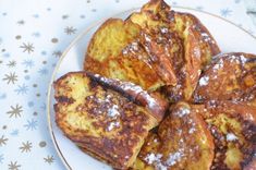 french toast on a plate with powdered sugar