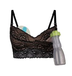 a bra that is next to a bottle with a pacifier in it and an empty cup on the side