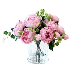 a vase filled with pink flowers on top of a table