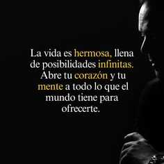 a man is looking down at his watch while wearing a black shirt and tie with the words la vista es hemosa, llena de positbilidados infinitables infinitas intimitass abre