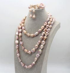 ♥Item No: NL2260 ♥ Materials: freshwater pearl ♥ Pearl Size:14-16X21-25mm (Approx) ♥Necklace length:17 inches,23 inches,29 inches If you need any other length necklace, please contact me. ♥ Pearl Shape:irregular ♥ Color:purple pink  ♥ Grade(my shop): AAA ♥ Pearl luster: good ♥ Body : With tiny blemishes ------------------------------- ♥EXPRESS Shipping link: https://www.etsy.com/listing/711756901/express-shipping-service-add-onupgraded?click_key=eeda7ee57ce6b278b7bc23954c1e3ed49710322d%3A711756901&click_sum=299de54a&ref=shop_home_active_1&frs=1 ♥Pearl necklace link: https://www.etsy.com/shop/YouPearlSandDIY?ref=seller-platform-mcnav§ion_id=26199105 ♥Pearl earring /bracelet link: https://www.etsy.com/shop/YouPearlSandDIY?ref=seller-platform-mcnav§ion_id=26236123 ♥Pearl set link: https://www Pearl Jewelry Sets With Pearl Chain, Elegant Purple Pearl Necklace, Luxury Purple Elegant Pearl Necklace, Elegant Pink Baroque Pearl Necklace, Luxury Purple Pearl Necklace, Elegant, Baroque Pearls Jewelry, Pear-shaped Baroque Pearl Necklace With High Luster, Long Pearl Necklaces, Pearl Jewelry Sets