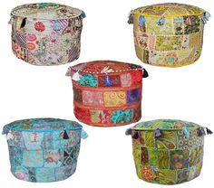 six different colored containers with designs on them