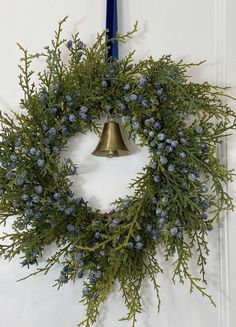 Juniper Berry Christmas Decor, Bells On Front Door, Candle Wreath Rings, Blue Ribbon Wreath, Juniper Berry Wreath, Kitchen Hood Wreath, Navy Christmas Wreath, Juniper Christmas Decor, Victorian Christmas Wreath