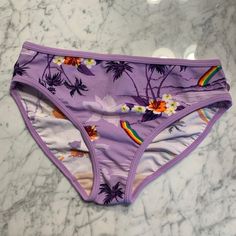 Basic Pantie Shape With Rainbow & Beach Graphic Designs. Never Used, Practically New And Clean Condition. From Old Navy. Purple Brief Swimwear For Summer, Lavender Summer Bottoms For Vacation, Lavender Summer Vacation Bottoms, Purple Brief Swimwear For Vacation, Purple Stretch Swimwear Brief, Purple Stretch Brief Swimwear, Stretch Lavender Beach Bottoms, Stretch Lavender Bottoms For The Beach, Casual Purple Swimwear For Beach Season