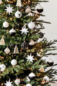 a christmas tree with ornaments hanging from it