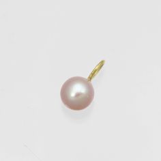 This is a handcrafted 14k yellow gold pearl pendant with a natural 7mm round AA grade cultured freshwater pink pearl. Comes on your choice of a 16 or an 18 inch 14ky gold cable chain. The artist's tag is attached at the clasp. Bail is 3.7mm inner diameter. Comes with a lifetime warranty, polishing cloth, care card, and a gift box. Available with a 5mm pearl: https://www.etsy.com/listing/927500998/pink-pearl-drop-necklace-in-14k-yellow?ref=shop_home_feat_4&frs=1 Available in rose gold: https: 14k Gold Pearl Necklace With Round Pendant, Pink Akoya Pearl Jewelry With Pearl Drop, Pink Akoya Pearl Drop Jewelry, Classic Pink Pearl Pendant Jewelry, Birthstone Jewelry Mothers, Pearl Drop Pendant, Morganite Pendant, Pearl Drop Necklace, Sweet Nothings