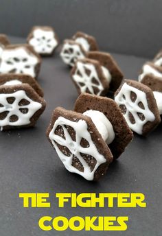 some brownies with white frosting on them and the words te fighter cookies above it