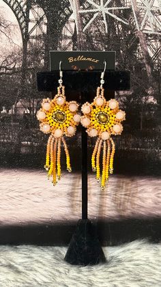 Beautiful handmade earrings made by Mexican artisans. Handmade Artisan Dangle Chandelier Earrings, Artisan Handmade Dangle Chandelier Earrings, Handmade Bohemian Dangle Clip-on Earrings, Bohemian Handmade Drop Clip-on Earrings, Handmade Bohemian Drop Clip-on Earrings, Unique Flower Shaped Single Earring, Unique Single Flower Earring, Artisan Handmade Adjustable Beaded Earrings, Artisan Adjustable Dangle Earrings