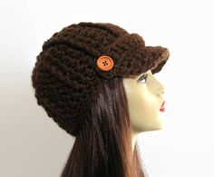 This is made to order. This hat is crocheted with chunky weight acrylic brown yarn. Buttons may vary depending on availability. If you would like a different color just let me know. Some of the other colors I have are black, black tweed, brown, brown tweed, oatmeal tweed, taupe, gray tweed, light gray, dark purple and white. However, if you want a different color I can get whatever you like. Hand wash is recommended. Check out all my newsboy hats here: https://www.etsy.com/shop/CreativeDesignsby Adjustable Brown Brimmed Crochet Hat, Brown Yarn Brimmed Hat, Adjustable Crochet Brown Hat, Adjustable Brown Crochet Cap, Brown Brimmed Crochet Hat One Size, Brimmed Brown Crochet Hat For Fall, Brown Hand Knitted Cap, Hand Knitted Brown Cap, Brimmed Brown Crochet Hat For Winter