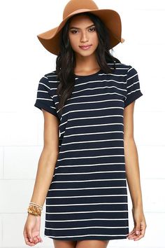 The Cafe Society Navy Blue Striped Shirt Dress is cool enough for the cafe crowd, and comfy enough for cuddling on the couch! Stretch knit shapes this casual t-shirt dress with a shift silhouette. Rounded neckline and short sleeves. Couch Stretch, Casual T Shirt Dress, Tennis Skirt Outfit, Cafe Society, Shirt Dress Outfit, Striped T Shirt Dress, Latest Fashion Dresses, Striped Shift Dress, Black Striped Dress