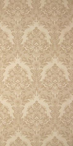 an old fashioned wallpaper pattern in beige and white