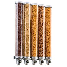 four different types of grain dispensers lined up in a row on a white background