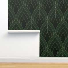 a wall with a green and gold pattern on it