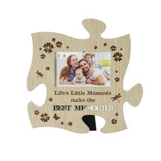 a wooden puzzle frame with the words'life's little moments make the best memories