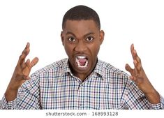 a man making an angry face with his hands