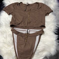 Brand New Bathing Suit Size 6 Bottom And Top Trendy Fitted Swimwear For Day Out, Fitted Short Sleeve Bodysuit For Vacation, Brown Summer Bodysuit For Poolside, Brown Bodysuit For Poolside Summer, Fitted Bodysuit For Beach Season, Casual Brown Bodysuit For Summer, Casual Brown Summer Bodysuit, Trendy Fitted Brown Swimwear, Fitted Brown Bodysuit For Beach Season