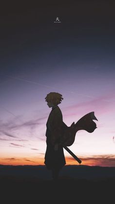 the silhouette of a person holding a horse in front of a purple and blue sky