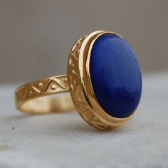 Oval Cab Blue Lapis Lazuli 925 Sterling Silver Ring, 18K Rose Gold, 18K Yellow Gold Round Lapis Ring, Blue Statement jewelry Gemstone : Lapis Lazuli Stone Size : 12 x 16 mm Ring Size : Please Choose Your Size stone Color : Blue Material : Please choose your metal It's a unique gift for anyone zodiac style ring . Please Notice before checkout :- Due to we use natural stones, the stones may vary slightly in shape, size and color. Contact us for any other gemstone customization before checkout. We Anniversary Yellow Gold Lapis Lazuli Rings, Yellow Gold Lapis Lazuli Gemstone Rings, Classic Lapis Lazuli Ring As A Gift, Classic Lapis Lazuli Ring As Gift, Elegant Lapis Lazuli Ring With Polished Finish, Yellow Gold Rings With Lapis Lazuli Gemstone, Gold Lapis Lazuli Gemstone Rings, Gold Rings With Lapis Lazuli Gemstone, Elegant Lapis Lazuli Rings For Formal Occasions