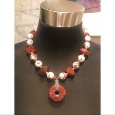 Beautiful Necklace For Winter! Carnelian Rust Colored Pendant And Beads Are The Stars Of The Show. Ceramic Beads And Swarovski Crystals Are Used As Accents. Toggle Clasp. Necklace Measures 19.5” End To End. This Is A High Quality, Hand Crafted Piece Of Art. Pictures Do Not Do It Justice. This Is Brand New And Ready For Your Closet. Red Beaded Necklaces With Natural Stones, Red Crystal Necklace With Gemstone Beads, Red Crystal Necklaces With Gemstone Beads, Red Crystal Necklace With Natural Stones, Adjustable Red Carnelian Necklace, Adjustable Carnelian Red Necklace, Red Carnelian Jewelry With Faceted Beads, Handmade Red Carnelian Beaded Necklaces, Red Carnelian Beads For Gift