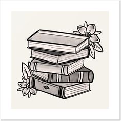 a stack of books with a flower on the top and one book in the middle