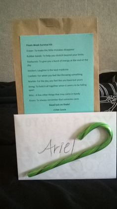 a piece of paper with the word arre written on it next to a note