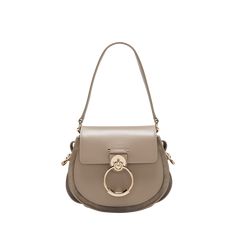 Chloe "Tess" crossbody bag in calf leather Detachable top handle  Detachable, adjustable crossbody strap Flap top with oversized ring accent  Approx. 6.7"H x 7.9"W x 2.8"D Made in Italy Chloe Tess, Small Crossbody Bag, Small Crossbody, 7 H, Crossbody Strap, Cross Body Handbags, Top Handle, Calf Leather, Chloe