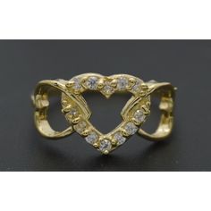 The Real 10k Yellow Gold Shiny Cz Textured Triple Heart Charm Ring Is A Stunning Piece Of Jewelry That Combines Elegance And Romance. Made From High-Quality 10k Gold, The Ring Features Three Interlocking Heart Charms, Each Adorned With A Sparkling Cz Stone That Adds A Touch Of Glamour To The Piece. At 1.7 Grams, The Ring Has A Substantial Weight That Feels Luxurious On The Finger, And It Is Available In All Sizes To Ensure A Perfect Fit For Anyone. This Ring Is Perfect For Expressing Love And Appreciation For A Special Someone Or As A Stylish Addition To Your Own Jewelry Collection. Specifications: Metal: Real 10k Yellow Gold (Stamped, 10k) Condition: Brand New Finish: Polished Weight: 1. Formal Heart-shaped Ring In Cubic Zirconia, Formal Heart-shaped Ring With Cubic Zirconia, Formal Heart-shaped Cubic Zirconia Ring, Gold Heart Ring With Diamond Accents Cubic Zirconia, Diamond Heart Ring Hallmarked, Diamond Heart Cut Ring Hallmarked, Gold Heart Ring With Pave Setting, Cubic Zirconia Heart Ring With Pave Setting For Wedding, Gold Diamond Heart Ring With Pave Setting