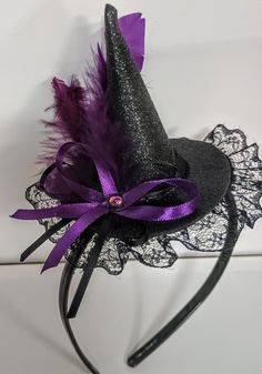 Halloween themed hair tiara.  Handmade witch tiara.  Very effective, made of dark purple satin, black lace, feathers, satin ribbons, beading. Suitable gift for girls, interesting accessory for Halloween party.   The diadem  is available at the moment and it is ready to be send to 1 days after a confirmed payment.   International shipping:  Shipping worldwide with tracking number of the order.International parcels are only sent after a confirmed payment of the chosen product,with Post One.  Expec Witch Hat With Feathers, Tiara Handmade, Tiara Halloween, Witch Hat Headband, Witch Headband, Halloween Hair Accessories, Shabby Chic Accessories, Hair Tiara, Witch Hat Halloween