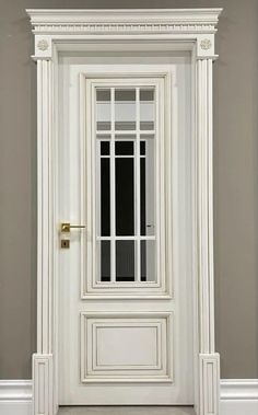 a white door with two windows in it