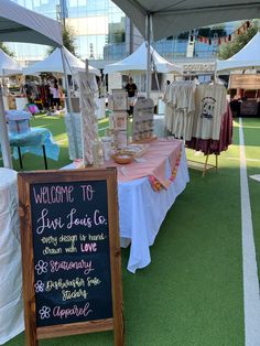 a table with some food on it under a tent