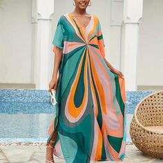 Bright Colorful Colorblock V-Neck Maxi Dress - Beach Cover-Up Dress Details Maxi Length / Batwing Sleeves / V-Neckline / Oversized Fit Fabric 100% Viscose Color Multicolor Summer Multicolor V-neck Maxi Dress, Multicolor Flowy V-neck Maxi Dress, Chic Multicolor Maxi Dress For Beach Cover-up, Colorful V-neck Beach Dress, Colorful V-neck Vacation Dress, Orange V-neck Maxi Dress For Vacation, Orange V-neck Maxi Dress For Beach, Orange V-neck Summer Maxi Dress, Orange V-neck Dress For Vacation