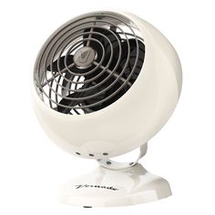 a white fan sitting on top of a table