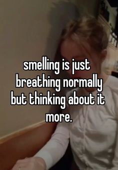 a woman sitting in a chair with her hand on her head and the caption saying, smiling is just breathing normally but thinking about it more