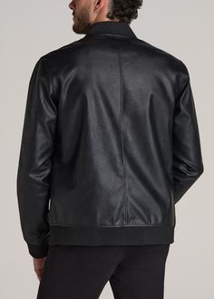 About Our Faux Leather Bomber Jacket for Tall Men Meet the tall men's leather bomber jacket designed for the modern day. Built with a faux leather exterior and a smooth polyester interior, it has a soft-on-the-skin feel. We designed this jacket with a slightly longer fit than a standard bomber, making this a jacket for tall men that’s actually tailored to your height. The exterior features two welt pockets with zippered closures for secure storage for your phone, keys, or wallet. The interior ha Black Leather Biker Jacket With Faux Pockets, Sleek Leather Jacket For Fall, Sleek Black Faux Leather Biker Jacket, Modern Faux Leather Business Outerwear, Black Faux Leather Jacket With Faux Front Pockets, Black Faux Leather Outerwear With Faux Pockets, Tall Men, Men In Black, Tapered Jeans