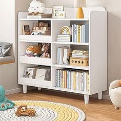 a child's room with a white bookcase and toy cars on the floor