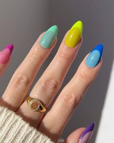 A bold and modern take on nail art with vibrant color blocks in shades of pink, green, yellow, and blue. Each nail showcases a unique combination of colors, creating a striking, eye-catching design. The smooth, oval shape enhances the vibrant hues, making this manicure perfect for making a statement.@cirquecolors Color Block Nails, Bee Nails, Neon Nail Designs, Electric Daisy, Cirque Colors, Mile High Club, Tropical Nails, High Roller