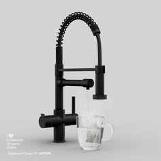 a black faucet with a glass next to it and water running from the faucet