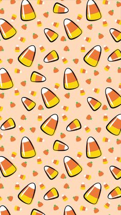 an orange and yellow pattern with hearts on it