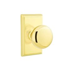 an image of a golden door knob on a white background