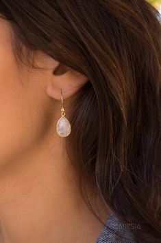 Moonstone Earrings ~ Gold Vermeil ~Dangle ~ Jewelry ~ Natural ~ Organic ~ Everyday~ Delicate~ minimalist Boho ~ Hippie 》D E T A I L S《 ✦ M E T A L : Gold Vermeil ✦ S T O N E : Moonstone ✦ B I R T H S T O N E : June ( Moonstone ) 💎 Because of the name, this stone always had a strong connection with the magic of the moon. The moonstone is known as a protection for travelers, a gift of love & passion and a path to wisdom. ✧ Please note natural gemstones are unique and may vary in shape or colo White Crystal Earrings For Everyday Wear, Dainty White Teardrop Crystal Earrings, Dainty Moonstone Earrings For Everyday, Everyday White Wire Wrapped Earrings, Everyday Moonstone Dangle Earrings, Everyday Moonstone Dangle Jewelry, Moonstone Teardrop Jewelry For Everyday, Everyday Teardrop Moonstone Jewelry, Moonstone Earrings Gold