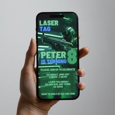 a person holding up an iphone case with the text laser tag peter is turning 8