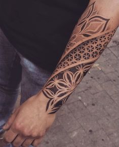 a person with a tattoo on their arm